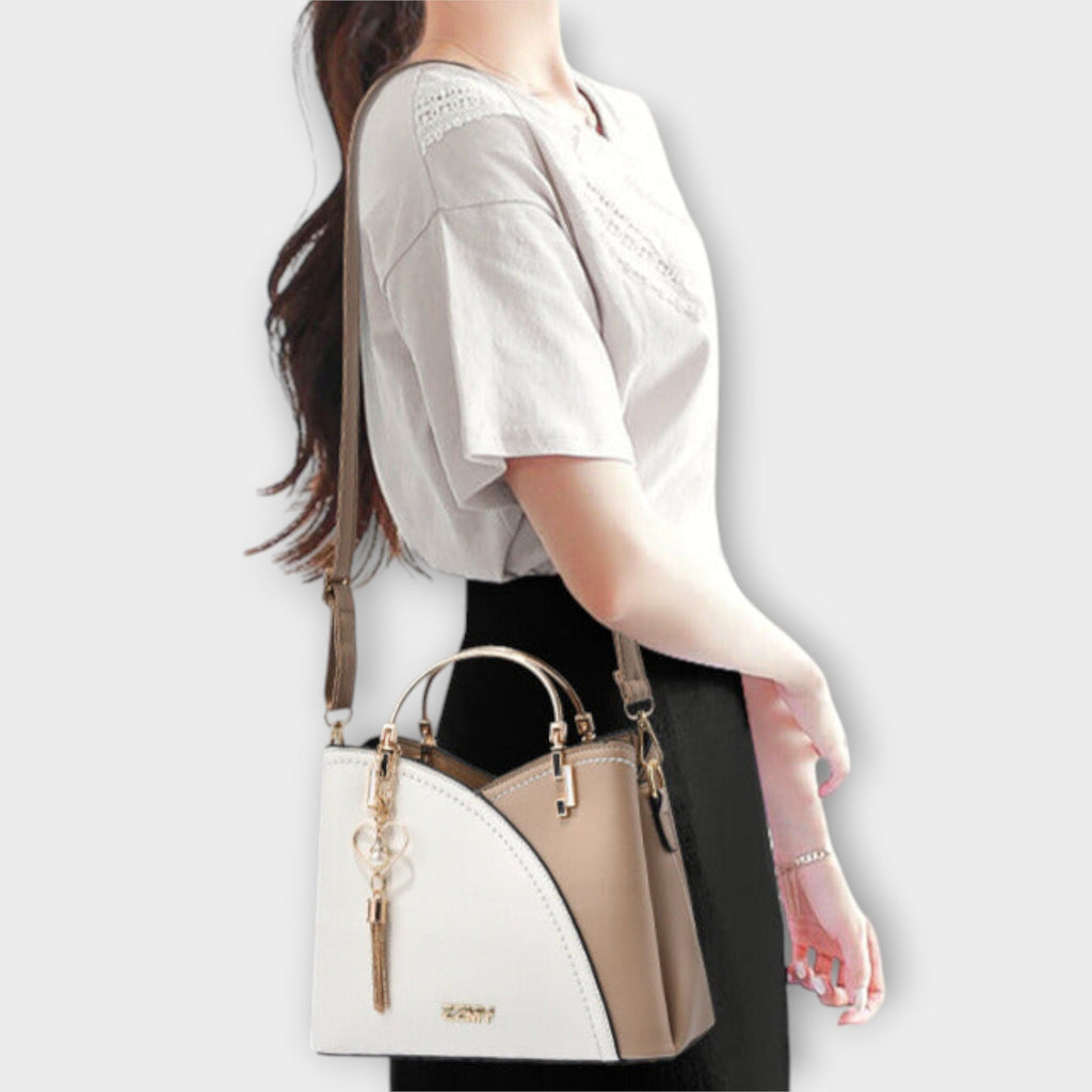 Luxe Handbag With Gold Detailing For Day To Night Use