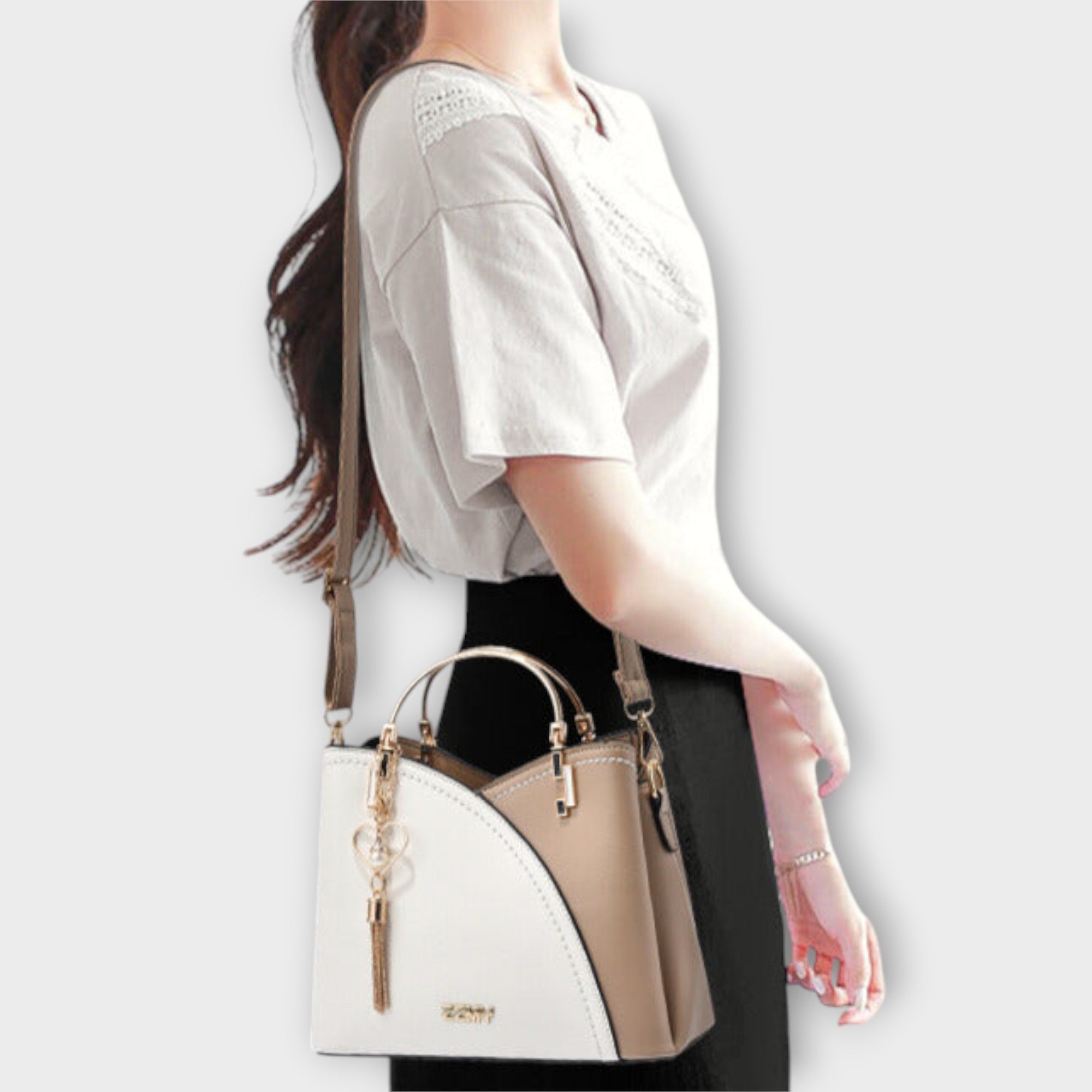 Luxe Handbag With Gold Detailing For Day To Night Use