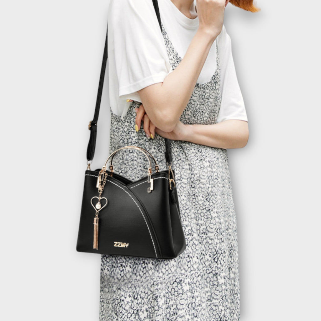 Luxe Handbag With Gold Detailing For Day To Night Use